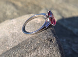 platinum emerald cut pink tourmaline and diamond estate ring