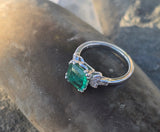 Platinum emerald and diamond estate ring