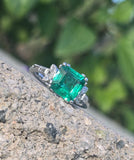 Platinum emerald and diamond estate ring