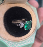 Platinum emerald and diamond estate ring