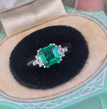 Platinum emerald and diamond estate ring