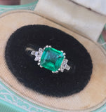 Platinum emerald and diamond estate ring