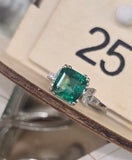 Platinum emerald and diamond estate ring