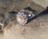platinum pearl and diamond estate halo ring