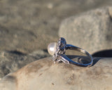 platinum pearl and diamond estate halo ring