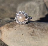 platinum pearl and diamond estate halo ring
