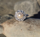 platinum pearl and diamond estate halo ring