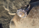 platinum pearl and diamond estate halo ring