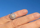 platinum pearl and diamond estate halo ring