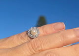 platinum pearl and diamond estate halo ring