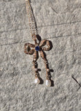 14k gold Victorian pearl and sapphire Bow necklace pendant lavaliere