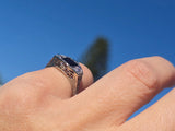 18k white gold filigree Art Deco blue sapphire and diamond estate ring