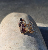14k gold garnet scroll studs - 4.32ct tw