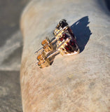 14k gold garnet scroll studs - 4.32ct tw