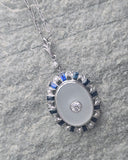 Platinum Art Deco c.1920's filigree crystal, sapphire and diamond antique pendant necklace