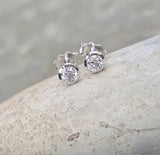 14k white gold bezel set European cut diamond studs earrings - .56ct tw