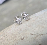 14k white gold bezel set European cut diamond studs earrings - .56ct tw