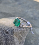 Platinum emerald and diamond estate ring