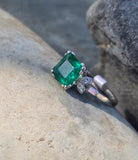 Platinum emerald and diamond estate ring