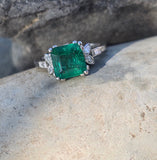 Platinum emerald and diamond estate ring