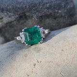Platinum emerald and diamond estate ring