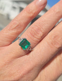 Platinum emerald and diamond estate ring