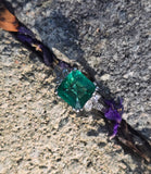 Platinum emerald and diamond estate ring