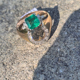 Platinum emerald and diamond estate ring