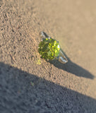 Platinum solitaire peridot antique ring