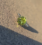 Platinum solitaire peridot antique ring