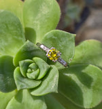 Platinum fancy yellow diamond estate ring