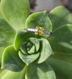 Platinum fancy yellow diamond estate ring