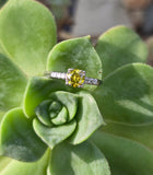 Platinum fancy yellow diamond estate ring