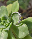 Platinum fancy yellow diamond estate ring