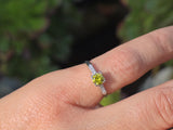Platinum fancy yellow diamond estate ring