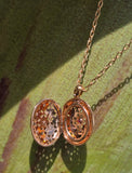 18k gold Robert Coin Granada diamond and ruby estate locket HOLD