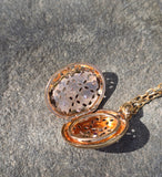 18k gold Robert Coin Granada diamond and ruby estate locket HOLD