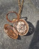 18k gold Robert Coin Granada diamond and ruby estate locket HOLD