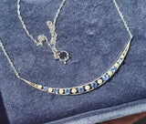 14k gold Art Deco pearl and sapphire antique crescent necklace