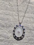 Platinum Art Deco c.1920's filigree crystal, sapphire and diamond antique pendant necklace