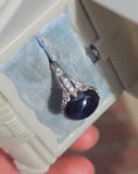 platinum Art Deco c.1920's cabochon blue sapphire and diamond antique filigree ring