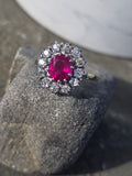 18ct white gold ruby and mine cut diamond estate halo ring