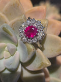 18ct white gold ruby and mine cut diamond estate halo ring