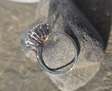 18ct white gold ruby and mine cut diamond estate halo ring