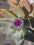 18ct white gold ruby and mine cut diamond estate halo ring