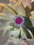 18ct white gold ruby and mine cut diamond estate halo ring