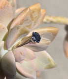 14k gold two-tone dark blue sapphire solitaire estate ring
