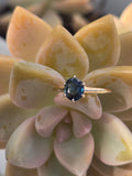 14k gold two-tone dark blue sapphire solitaire estate ring