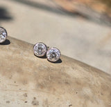 platinum and 14k gold bezel set European cut diamond studs earrings - .21ct tw