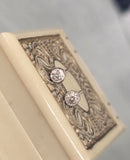platinum and 14k gold bezel set European cut diamond studs earrings - .21ct tw